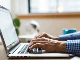 typing on a laptop